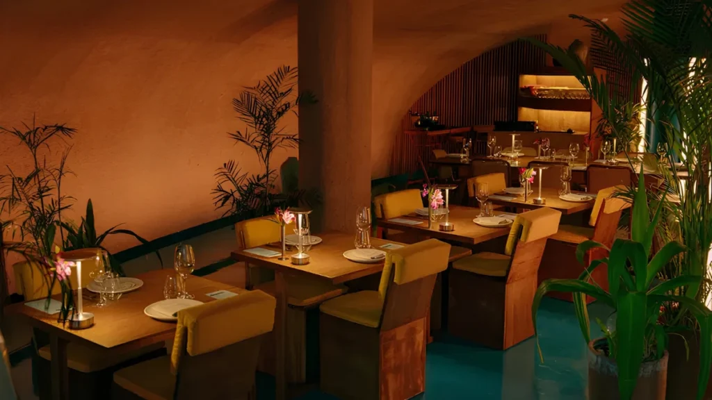 top-rated restaurants in bali featuring Dome Restaurant with warm tropical interior and elegant dining atmosphere